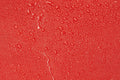 Water droplets on a red surface of Firefighter Rescue Step-In Turnout Fire Gear Bag