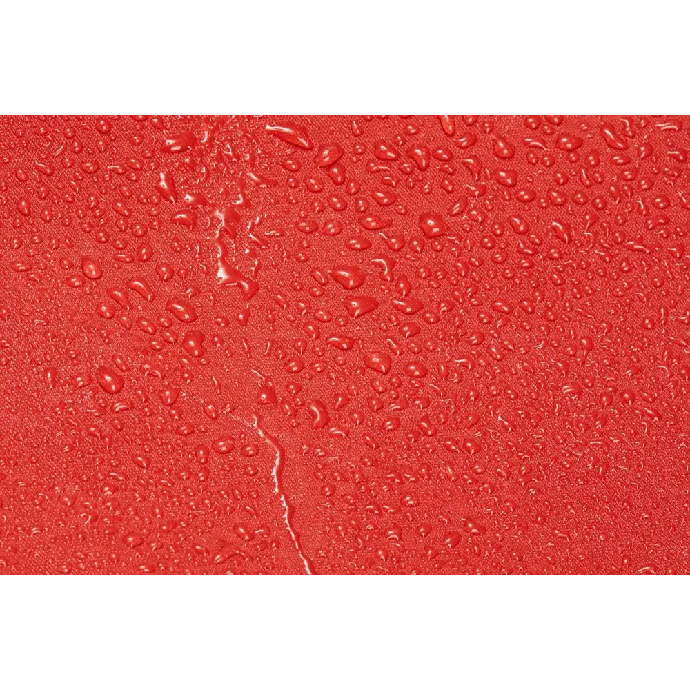 Water droplets on a red surface of Firefighter Rescue Step-In Turnout Fire Gear Bag