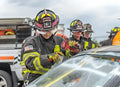 Firefighter using Crash Bag Kit to cut windshield for rescue in the ElitePlus+ Bag Kit