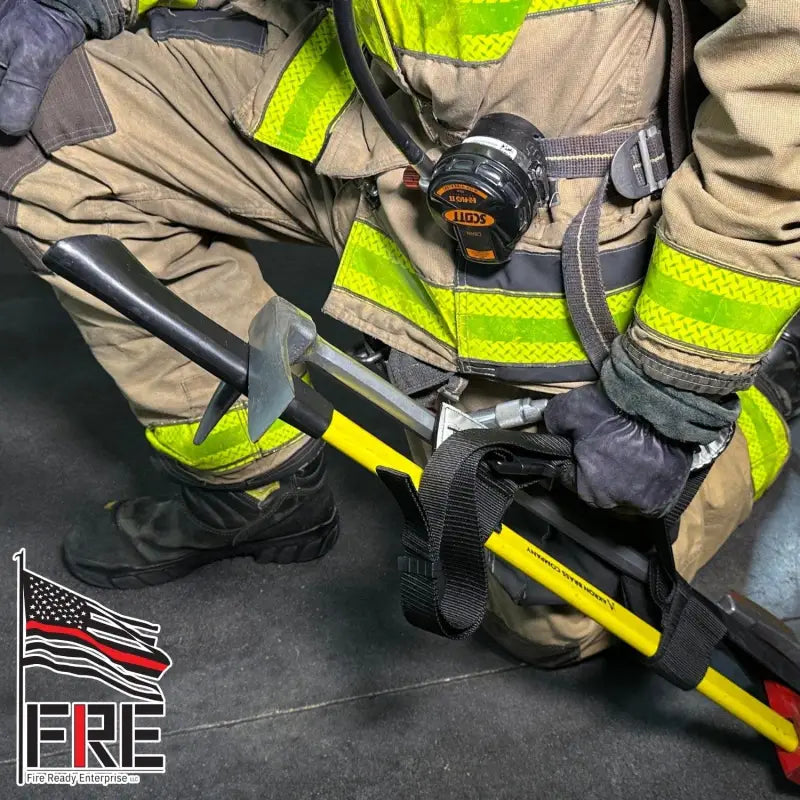 Firefighter’s boots and turnout gear with Irons Shoulder Strap and forcible entry tools