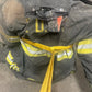 Firefighter’s turnout coat with yellow hose from Multipurpose Webbing Personal Carry Kit for fireground applications