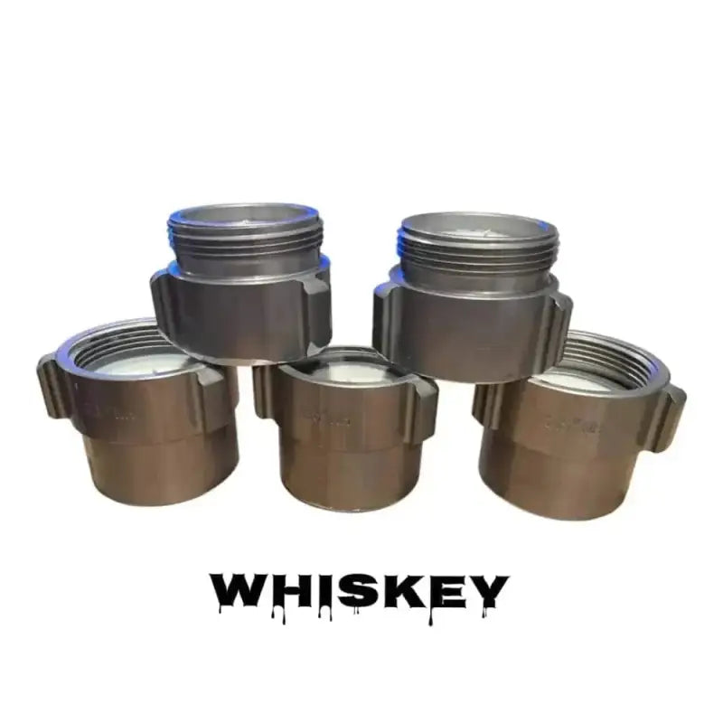 Five metallic Whiskey storage containers displayed with a Whiskey Coupling Candle