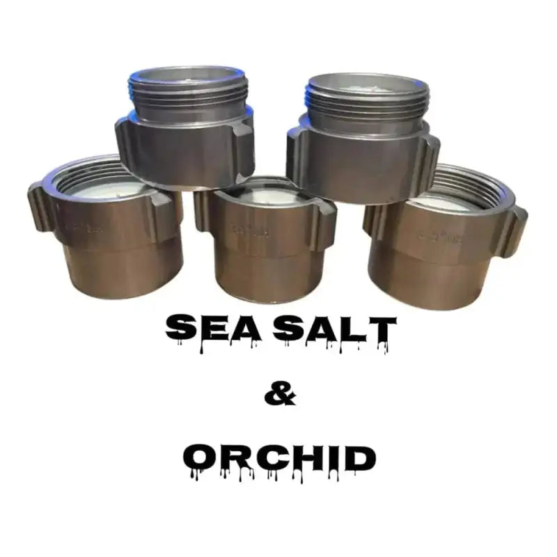 Five metallic containers with screw-on lids above Sea Salt & Orchid for Crafty American Orchid Coupling Candle