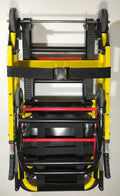 Folded yellow emergency evacuation stair chair with wall bracket for quick rescue