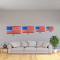 Four American flags on a wall showcasing Durable Metal American Flag with Red Silver and Gold Line Dispatch