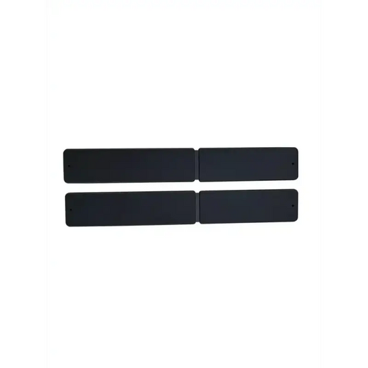 Four black rectangular strips in parallel rows from the Shove Knife Pack of 2