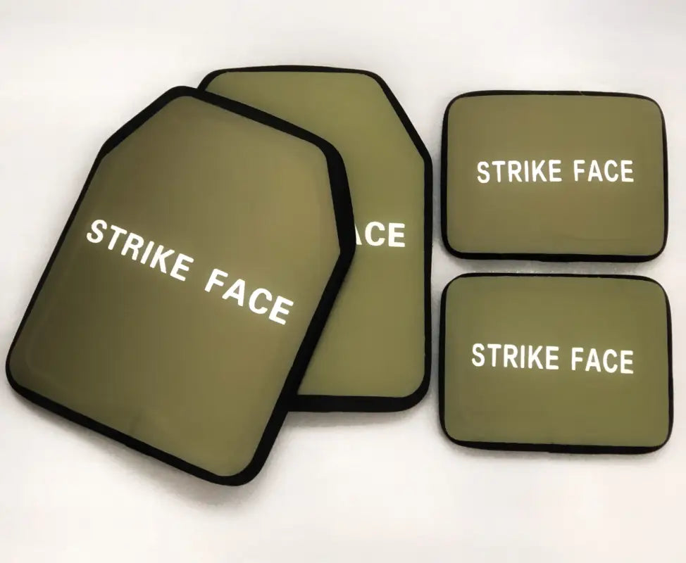 Four olive green ballistic plates with black trim from Crusader 2.0 body armor set with medical kit