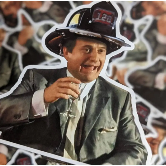 Smiling firefighter in a suit with champagne glass, featured on Funny How Sticker