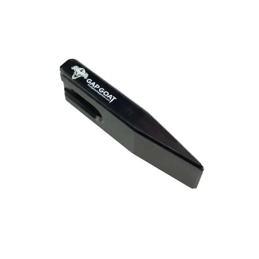 Black plastic Gap GOAT Mini Forcible Entry Wedge gadget with wedge design and branding