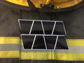 Geometric black and white triangular pattern on the BLACKED OUT BLUE AND GREY TRIPLE STRIPE REFLECTIVE HELMET