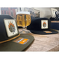 Glass of golden beer and Smokin Hop Brewery Hat with flaming logo patches