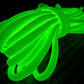 Glowing neon green Glow Dacron® rope coiled, ideal for enhanced resistance in emergency packs