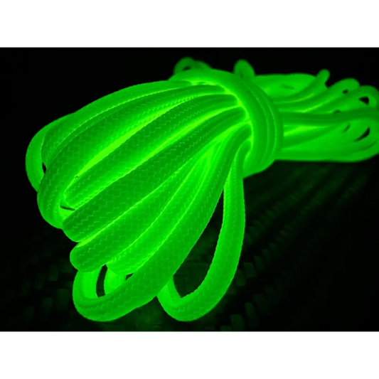 Glowing neon green Glow Dacron® rope coiled, ideal for enhanced resistance in emergency packs