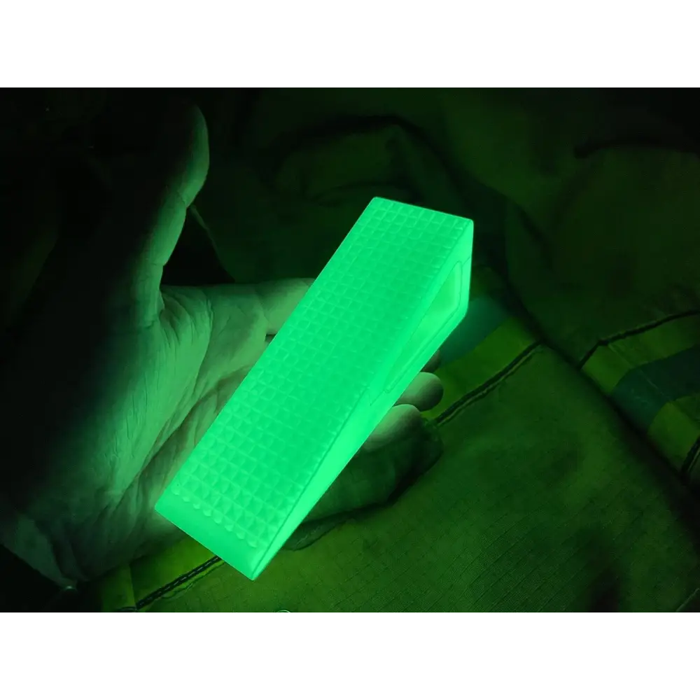 Glowing green crystal showcasing Glow - Extreme Grip The Door Wedge in high durometer silicone