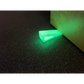 Glowing green doorstop wedge made of high durometer silicone for extreme grip