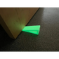 Glowing green Glow - Extreme Grip doorstop wedge made of high durometer silicone