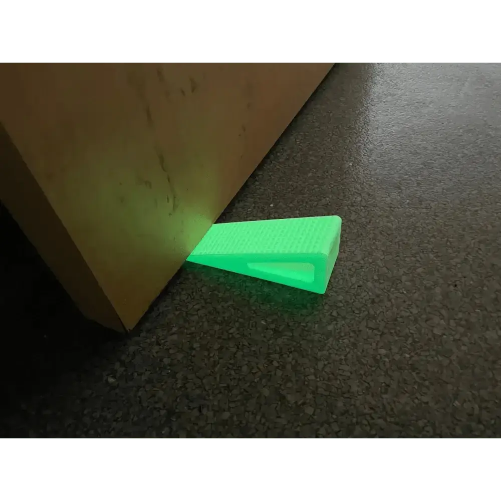 Glowing green Glow - Extreme Grip doorstop wedge made of high durometer silicone