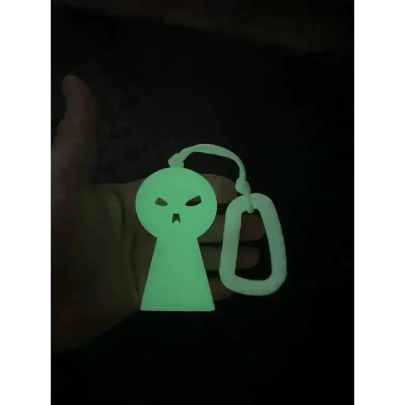 Glow-in-the-dark ghost keychain for Williams Wedge, perfect for first responders