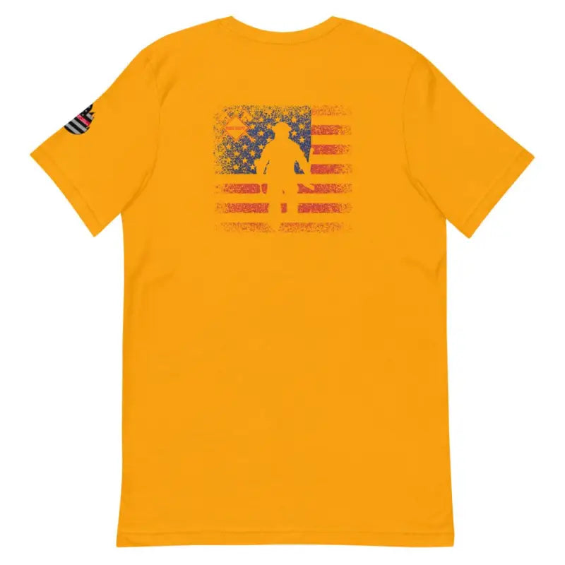 Gold t-shirt with distressed American flag and soldier design, perfect for patriotic fans