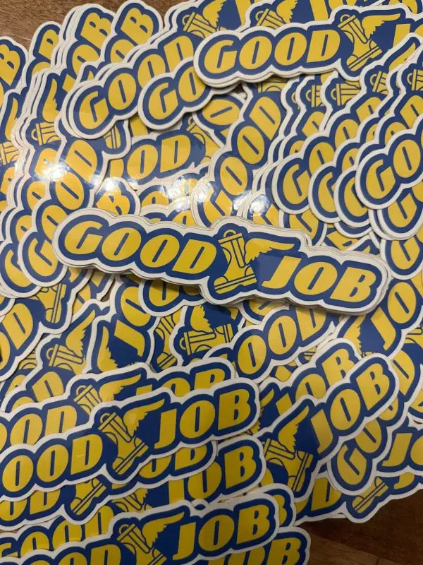 Blue and yellow Good Job stickers featuring thumbs-up icons for first responders