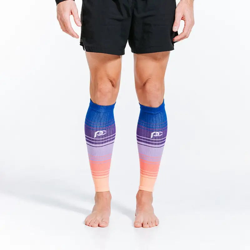 Gradient compression calf sleeves in blue, purple, and coral from Florida Skies