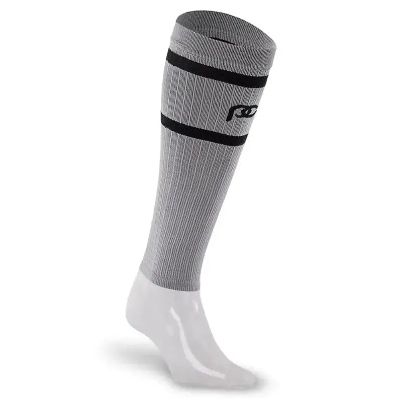 Gray compression calf sleeves with black stripes and white foot portion for athletes