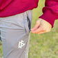 Gray Polyester Joggers - Iron with white logo, perfect for first responders