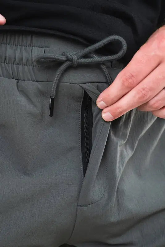 Gray Carrier Traveler Joggers with zippered pocket and concealed carry waistband