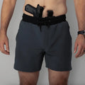 Gray carrier training shorts with concealed carry firearm and 5-inch inseam