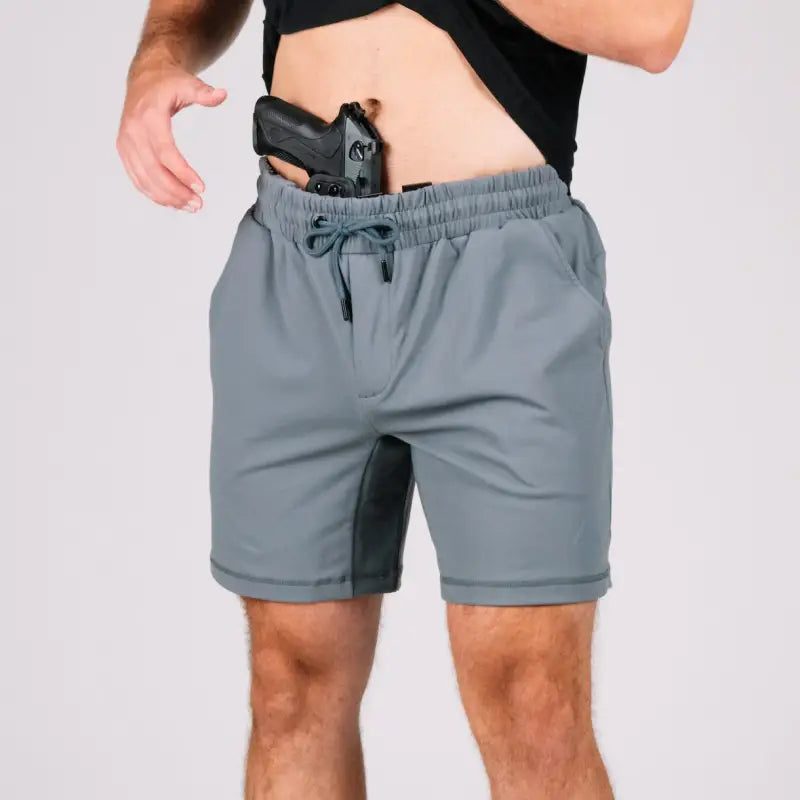 Gray carrier shorts with concealed carry pocket from Arrowhead Tactical Apparel