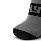 Gray no-show running socks with black accents designed to prevent hot spots