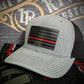Gray and black baseball cap with a red line leather patch featuring a thin red line flag