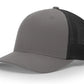 Gray and black trucker hat with Backdraft Bastard leather patch for first responders