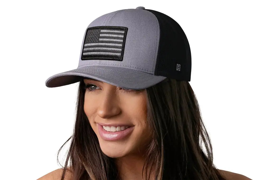 Gray and black trucker hat with American flag patch, perfect USA Snapback accessory