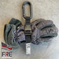 Gray firefighting glove with SMC Black Oval Carabiner for a secure glove strap