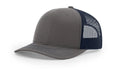Gray and navy trucker hat with serpent skull leather patch for a stylish look