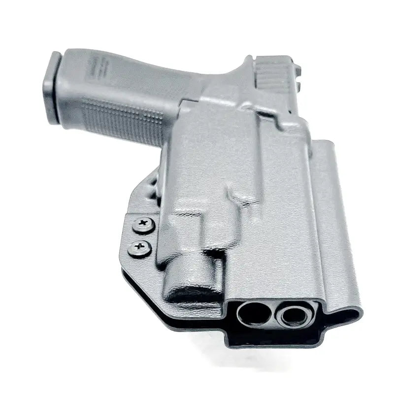Gray pistol in a holster showcasing Glock 17 with Streamlight TLR-7 HL-X mounted