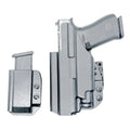 Gray Glock pistol and magazine in inside waistband holsters by Four Brothers Holsters