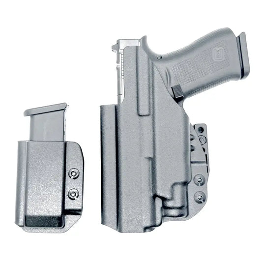 Gray Glock pistol and magazine in inside waistband holsters by Four Brothers Holsters