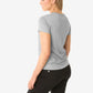 Gray women’s short-sleeve underscrub paired with stylish black pants for a chic look