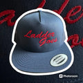 Gray Ladder Goes Hat featuring red embroidered text for first responders