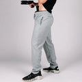 Gray Carrier Sweatpants Mk.II with patented carrier retention waistband and black shoes