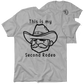 Gray t-shirt with cowboy graphic from My Second Rodeo Safety Yellow T-Shirt collection