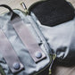 Gray tactical pouch with straps and snap closures for first responders pocket organizer