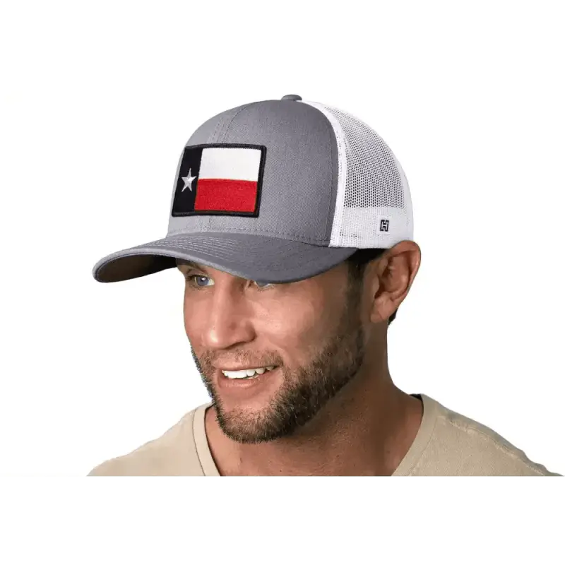 Gray and white Texas Flag Trucker Hat with a Texas state flag patch on a snapback