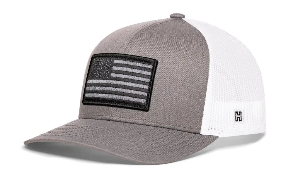 Gray and white USA Snapback American Flag Trucker Hat with black and gray patch