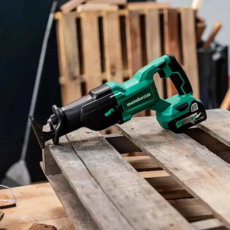 Green and black Metabo HPT CR18DBQ4M 18V MultiVolt Cordless Reciprocating Saw on wood