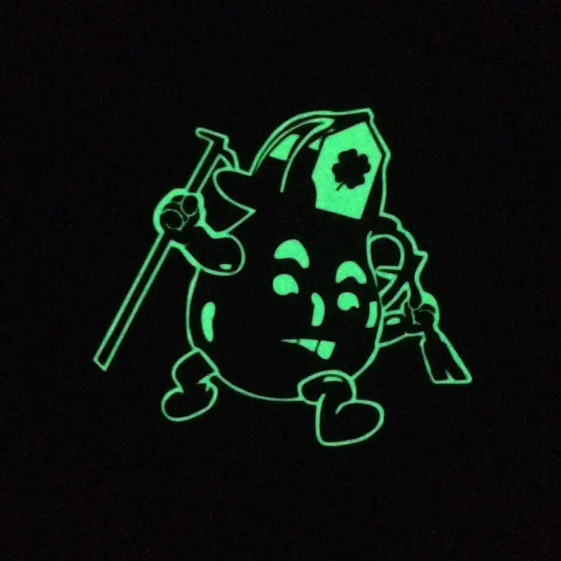 Glowing green cartoon character with tools in a birdhouse for Dont Drink the Koolaid