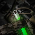 Green glowing marker light from M-Tac Glow Sticks 6’’ set of 5 for visibility