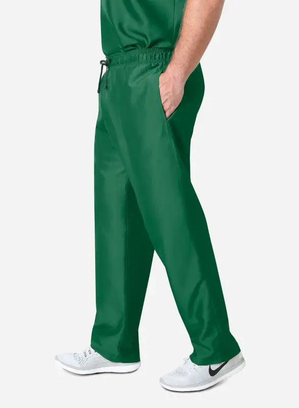 Green Men’s Simple Scrub Pants with elastic drawstring waist and white sneakers